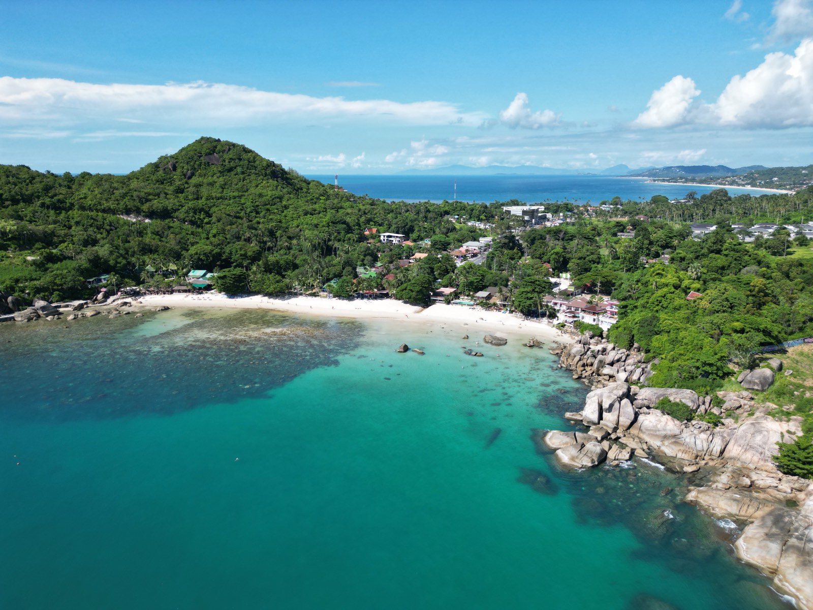 Silver Beach, Koh Samui — turquoise water between granite boulders